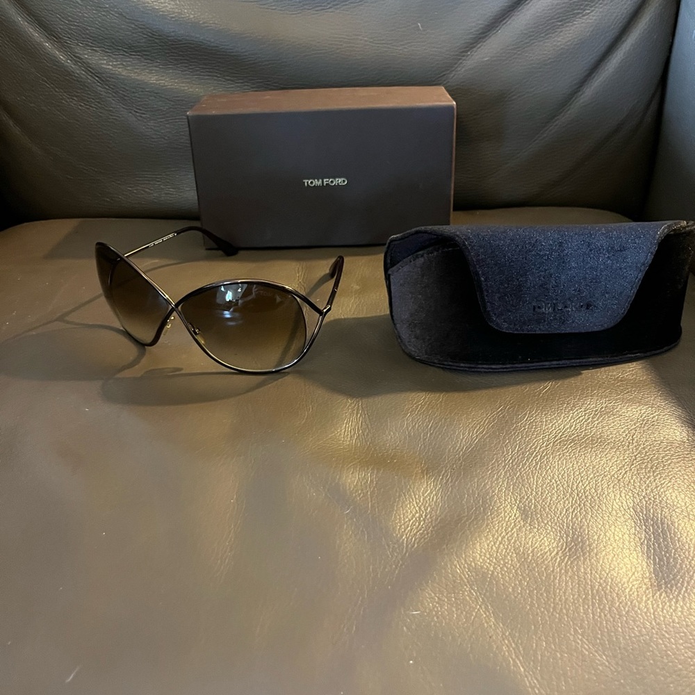 Tom Ford sunglasses worn only a few times and in like new condition.